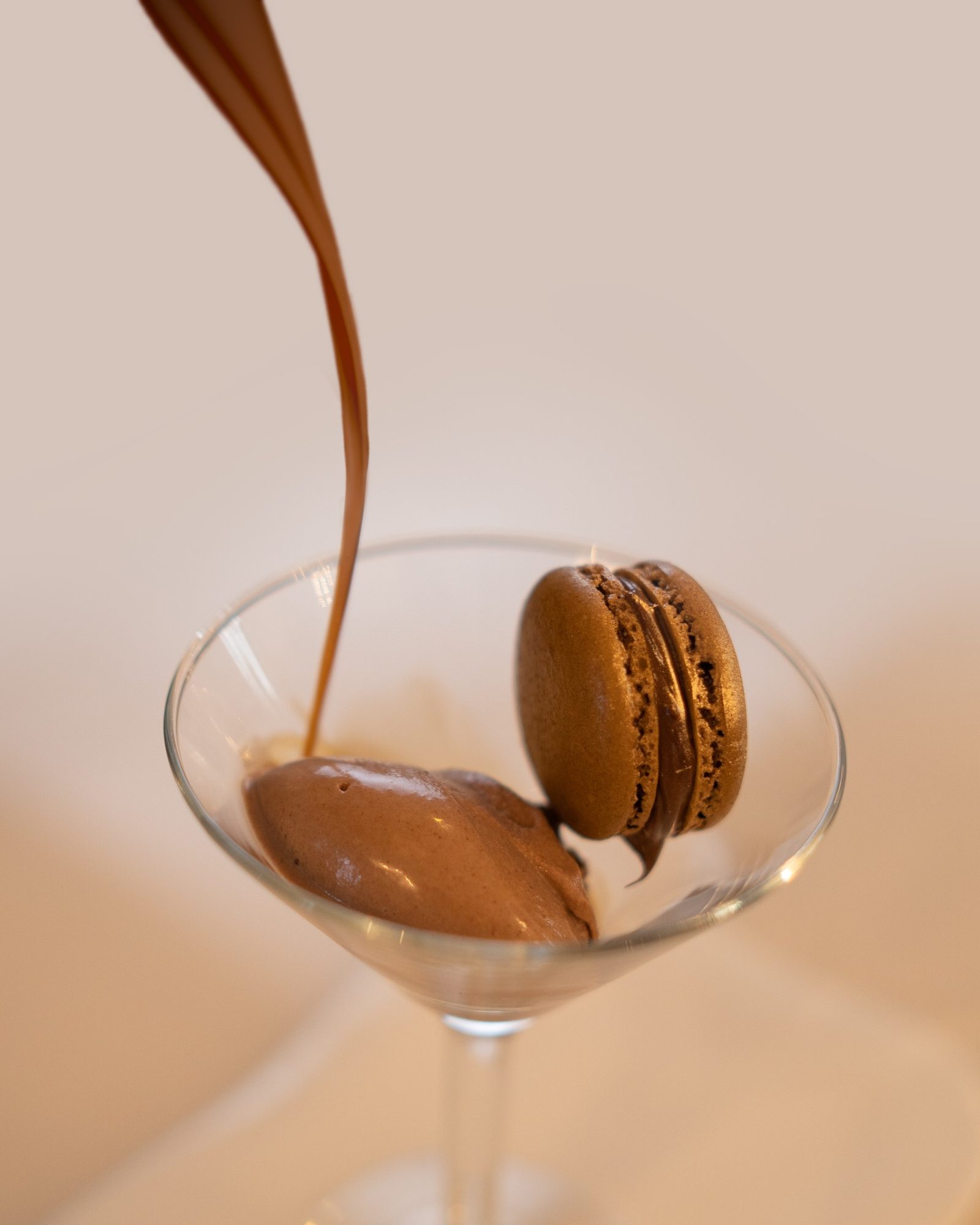 Chocolate mousse and macaron in glass